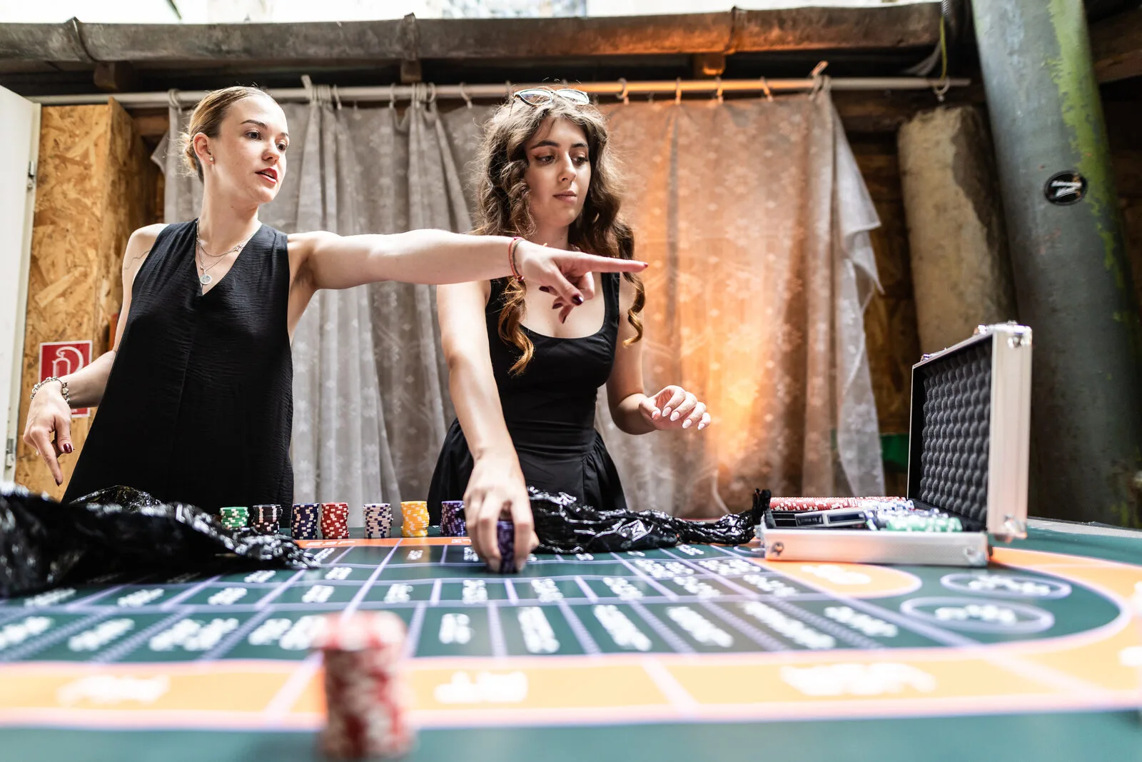 Croupiers dealing chips at the gaming table